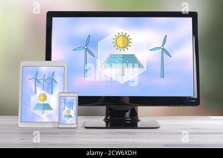 Clean energy concept shown on different information technology devices Stock Photo