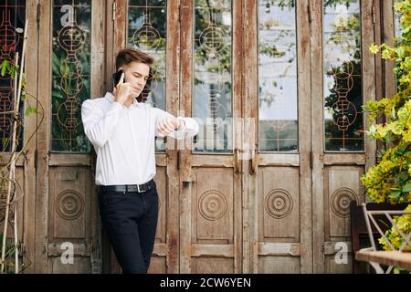 Man tired of waiting Stock Photo
