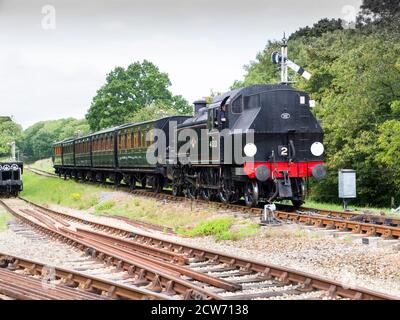 Locomotive 41313 on the Isle of Wight steam railway approaching ...