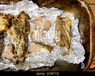 Roasted lamb ribs on baking tray Stock Photo
