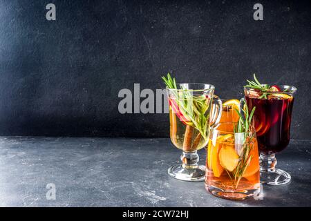 Various autumn winter alcohol drinks set. Different seasonal alcohol cocktails - mulled wine, glogg, grog, eggnog, ginger ale, hot buttered rum, punch Stock Photo