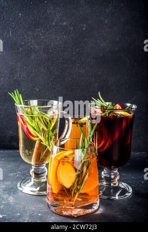 Various autumn winter alcohol drinks set. Different seasonal alcohol cocktails - mulled wine, glogg, grog, eggnog, ginger ale, hot buttered rum, punch Stock Photo