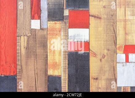 Old boards painted with multi-colored paint. Background from colored boards. Stock Photo