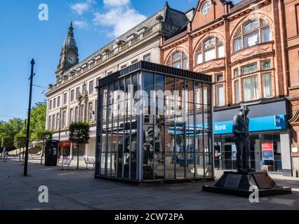 Statue of Fred Dibnah with town hall in background in Bolton Lancashire July 2020 Stock Photo