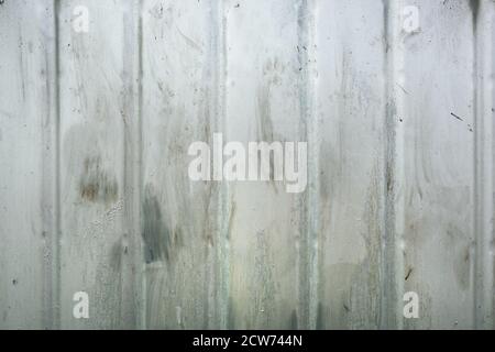 Corrugated steel metal background, weathered metallic surface pattern Stock Photo