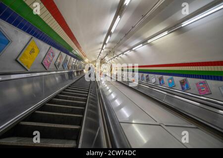 London, UK. 28 September 2020. Commuters travel into London during 'morning rush-hour', where the rush is still non-existent due to Covid-19 scare. Quiet escalators at Piccadilly Circus underground station. Credit: Malcolm Park/Alamy Live News. Stock Photo