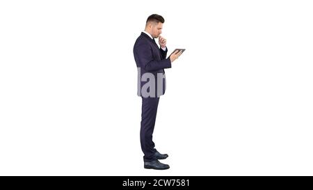 Smart senior businessman using a technology tablet on white back Stock Photo