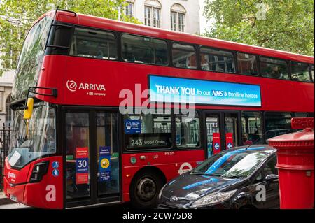 LONDON - SEPTEMBER 12, 2020: Red London Double Decker Bus with Thank You to NHS sign on the side Stock Photo