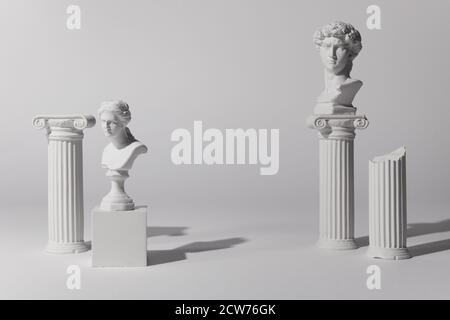 Background for product presentation. Antique columns ans statues on white background Stock Photo
