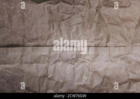 Crumpled kraft paper background. Packing paper. Background Stock Photo