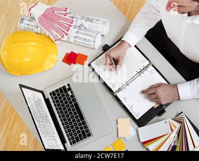 Building contractor working on project Stock Photo
