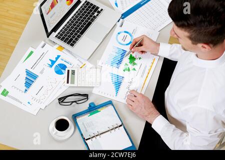 Businessman working on financial data Stock Photo