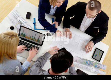 Development team at desk Stock Photo