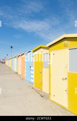 Colourful beach huts on Seaford beach. Seaford, East Sussex, England, UK Stock Photo