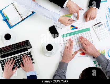 Business people working on financial data Stock Photo