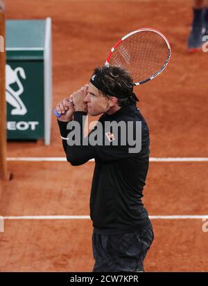 Paris, France. 28th Sep, 2020. Dominic Thiem of Austria reacts during the men's singles first round match against Marin Cilic of Croatia at French Open tennis tournament 2020 at Roland Garros in Paris, France, Sept. 28, 2020. Credit: Gao Jing/Xinhua/Alamy Live News Stock Photo