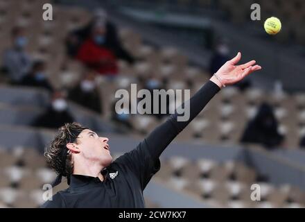 Paris, France. 28th Sep, 2020. Dominic Thiem of Austria serves during the men's singles first round match against Marin Cilic of Croatia at French Open tennis tournament 2020 at Roland Garros in Paris, France, Sept. 28, 2020. Credit: Gao Jing/Xinhua/Alamy Live News Stock Photo