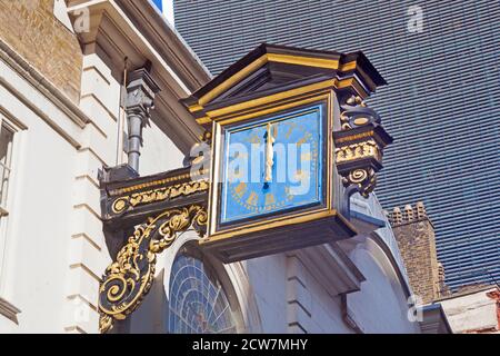 City of London. The large, ornamental clock at the church of St Mary-at-Hill in Lovat Lane in Billingsgate ward. Stock Photo