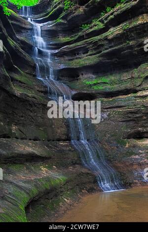 Cascading water and whipping winds have carved the sandstone walls at the entrance of French Canyon. Stock Photo