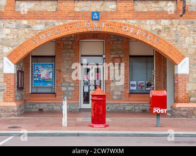 Australia Post modern and traditional red mailboxes in front of York Post Office on Avon Terrace York Western Australia. Stock Photo