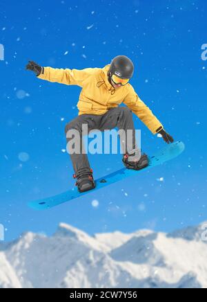 Snowboarder performing a tail grab Stock Photo