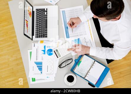 Businessman working on financial data Stock Photo