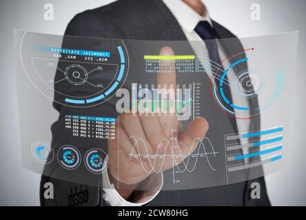 Businessman using a digital virtual touch screen Stock Photo