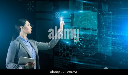 Business Innovations. Businesswoman Pressing Button On Digiutal Virtual Screen Interface With Infographic Stock Photo