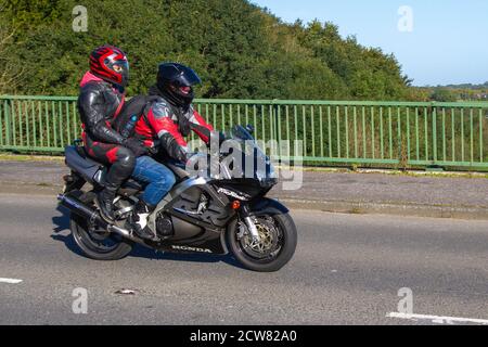 Black Honda Fireblade CBR ; Motorbike rider; two wheeled transport, motorcycles, vehicle, roads, motorbikes, bike riders motoring in Chorley, UK Stock Photo