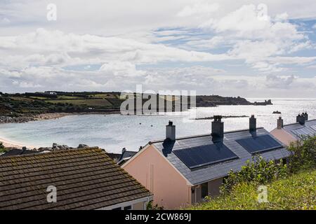 A view of Porthcressa bay and Peninnis Head seen over rooftops from the Garrison, St Mary's, Isles of Scilly Stock Photo