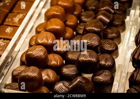 Las Vegas, US - 2020 :various chocolate pralines. shallow depth of field. Captured in Ethel M Chocolate Factory. Sweet, Happy, Fat, Holiday, valentine Stock Photo