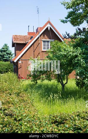 wooden country house in baltic region in summer Stock Photo