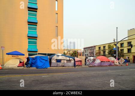 Los Angeles, CA, USA - September 12, 2020: Tents and shelters on street in the city in California, a sad alternative for socially disadvantaged and ho Stock Photo