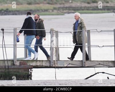 Queenborough, Kent, UK. 28th September, 2020. Paul O'Grady was spotted in Queenborough Harbour this afternoon, after returning from a journey out to sea on the X-Pilot tug filming a feature on the Red & Shivering Sands Forts out in the Thames Estuary for ITV. Credit: James Bell/Alamy Live News Stock Photo