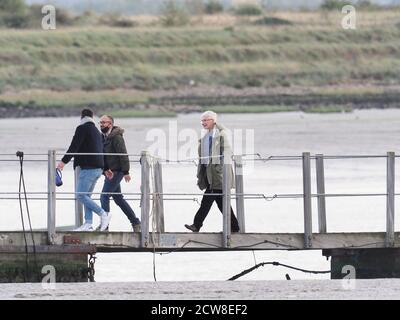 Queenborough, Kent, UK. 28th September, 2020. Paul O'Grady was spotted in Queenborough Harbour this afternoon, after returning from a journey out to sea on the X-Pilot tug filming a feature on the Red & Shivering Sands Forts out in the Thames Estuary for ITV. Credit: James Bell/Alamy Live News Stock Photo