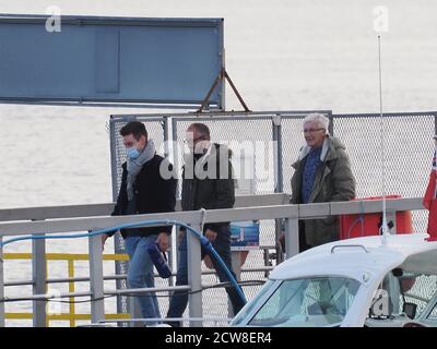 Queenborough, Kent, UK. 28th September, 2020. Paul O'Grady was spotted in Queenborough Harbour this afternoon, after returning from a journey out to sea on the X-Pilot tug filming a feature on the Red & Shivering Sands Forts out in the Thames Estuary for ITV. Credit: James Bell/Alamy Live News Stock Photo