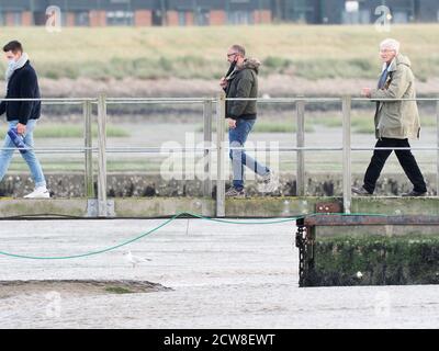 Queenborough, Kent, UK. 28th September, 2020. Paul O'Grady was spotted in Queenborough Harbour this afternoon, after returning from a journey out to sea on the X-Pilot tug filming a feature on the Red & Shivering Sands Forts out in the Thames Estuary for ITV. Credit: James Bell/Alamy Live News Stock Photo