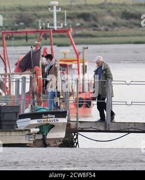 Queenborough, Kent, UK. 28th September, 2020. Paul O'Grady was spotted in Queenborough Harbour this afternoon, after returning from a journey out to sea on the X-Pilot tug filming a feature on the Red & Shivering Sands Forts out in the Thames Estuary for ITV. Credit: James Bell/Alamy Live News Stock Photo