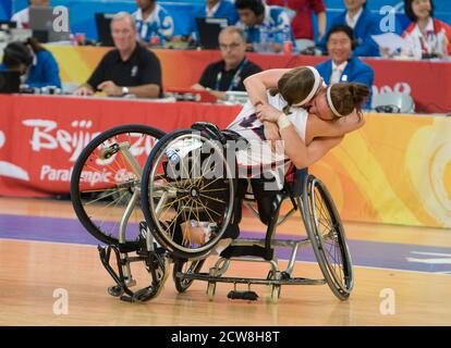 Beijing, China  September 14, 2008: Day nine of athletic competition at the 2008 Paralympic Games showing United States players Christina Ripp (l) and Carlee Hoffman (r) celebrating their 50-38 victory over Germany for the gold medal in women's wheelchair basketball at the Paralympic Games in Beijing.      ©Bob Daemmrich/ Stock Photo