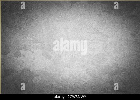 Gray decorative plaster texture with vignette. Abstract grunge background with copy space for design. Stock Photo