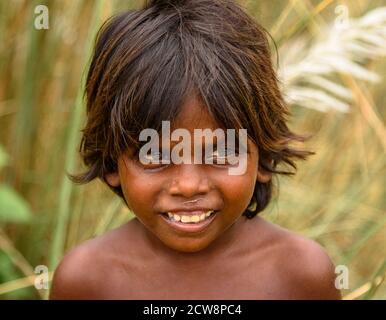 Durgapur/ India-September 24, 2020. Portrait of an Innocent Unidentified smiling kid. Selective focus is used. Stock Photo