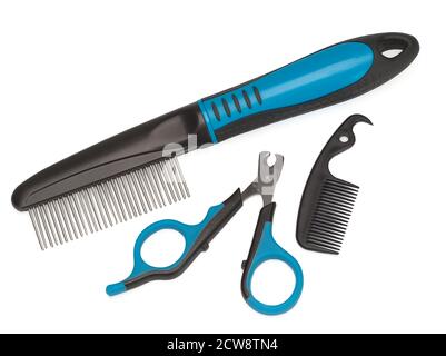 Close-up of a special veterinary tools for dogs and cats combing and clipping nails that lie on white background Stock Photo
