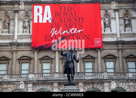 Statue of Sir Joshua Reynolds, first President of the Royal Academy. Press preview of the Summer Exhibition at the Royal Academy which opens October 6 Stock Photo