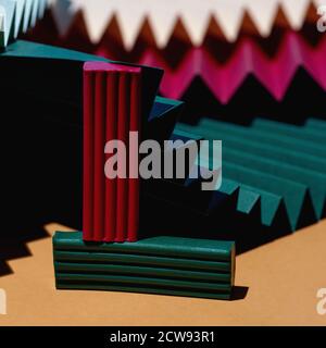 Modern multicolored composition of bars of clay and fans of cardboard. Stylish geometric concept. Stock Photo