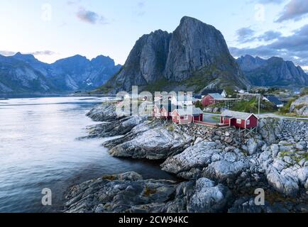 Famous tourist attraction Hamnoy fishing village on Lofoten Islands, Norway with red rorbu houses, in summer Stock Photo