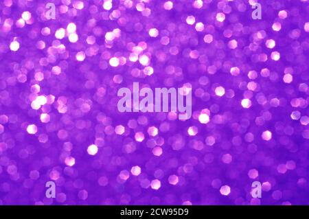 Colorful abstract blurred purple background, fuchsia glitter texture christmas Stock Photo