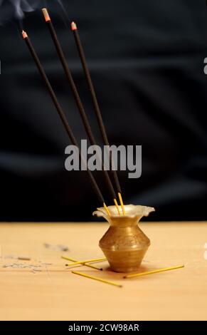 Handmade reed freshener on commode in living room Stock Photo