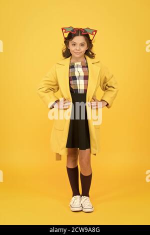 Dreaming about fame. Become popular. Celebrity child. Star concept. Fame and popularity. Popular schoolgirl. Carnival costume famous celebrity. Cheerful girl wear eyeglasses. Cool kid celebrity. Stock Photo