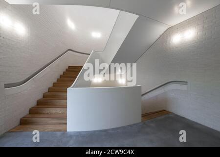 White spiral staircase in the Newport Street Gallery, London, United Kingdom Stock Photo