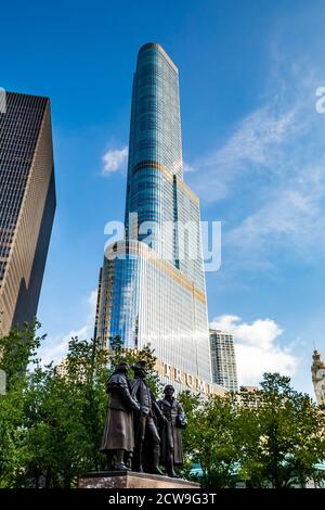 Chicago Heald Square Monument with Trump tower in background at summer Stock Photo